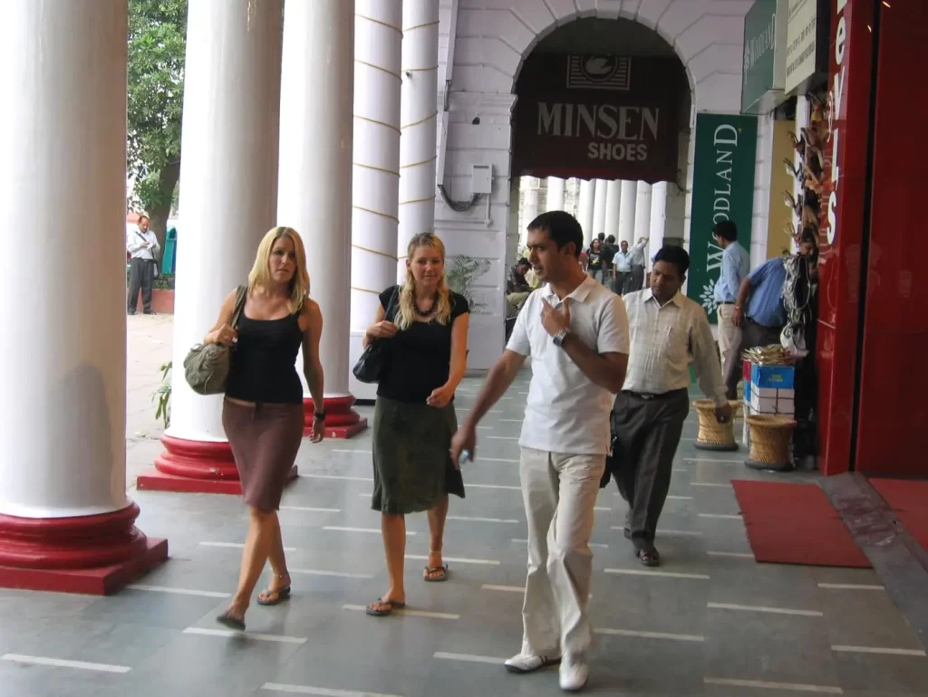 Tourist Visiting Connaught Place with Tour Guide