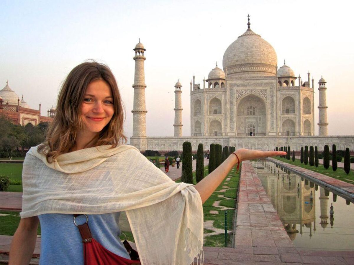 Girl Holding Taj Mahal In hand 1200x900 1