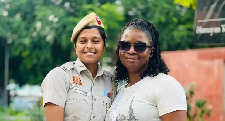 Tourist Poses with Delhi Police Officer During Golden Triangle Group Tour